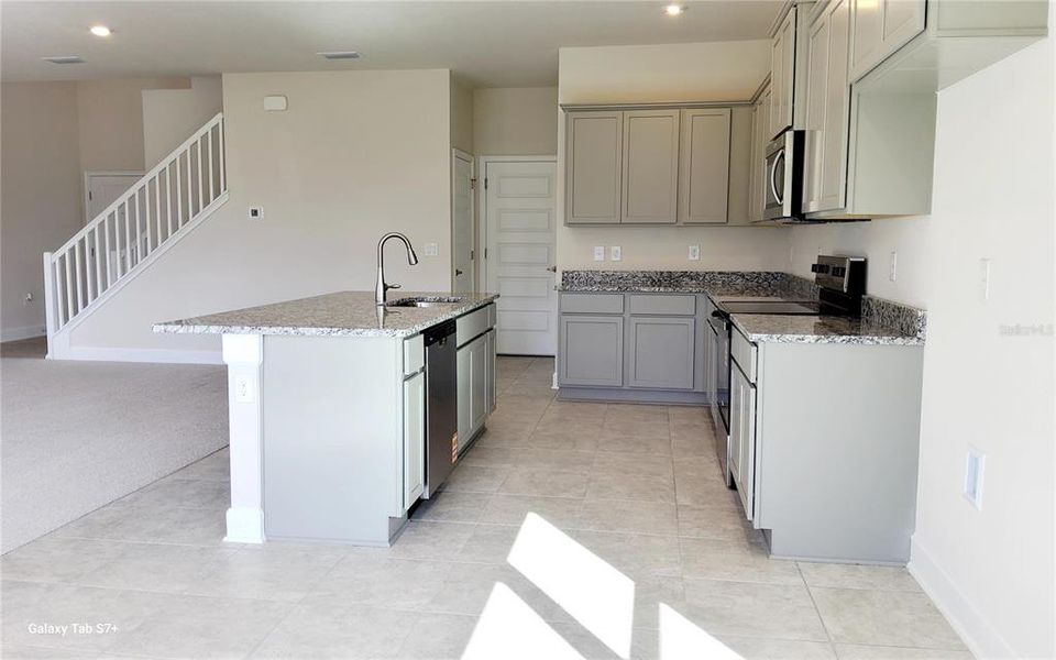 Furnished interior view inside a new home in , Harmony (Image 4).