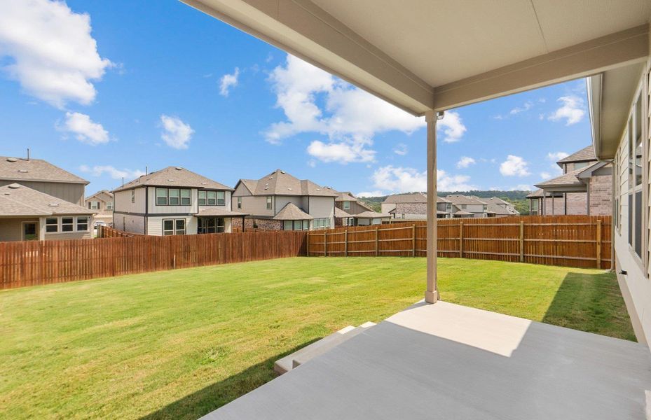 Exterior details and patio area of a home in Saddleback at Santa Rita Ranch, Liberty Hill (Image 2). Exterior details and patio area of a home in Saddleback at Santa Rita Ranch, Liberty Hill (Image 2).