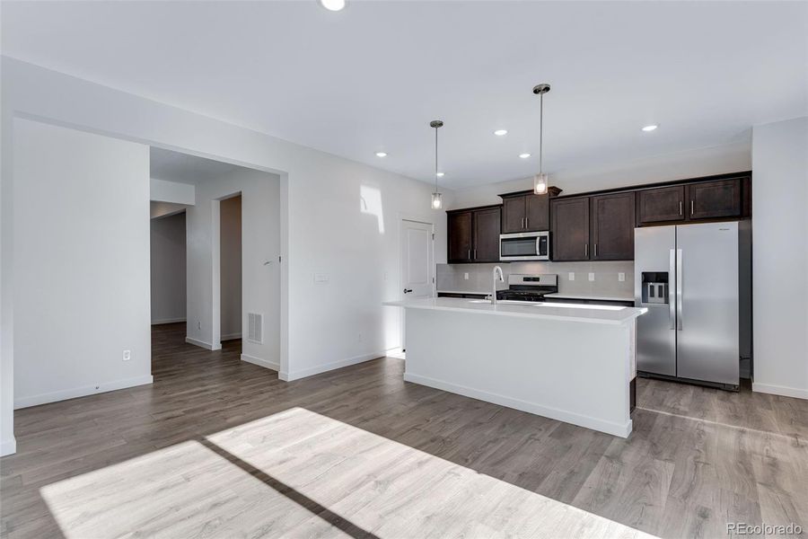 Furnished interior view inside a new home in Trails at Crowfoot, Parker (Image 14).