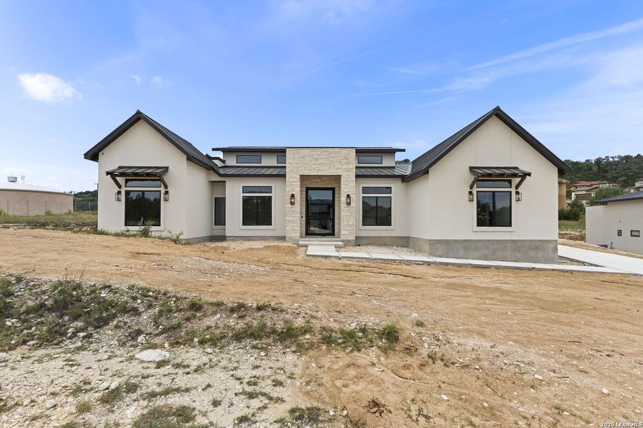 Front exterior of a new home in , San Antonio, TX, highlighting curb appeal (Image 32).