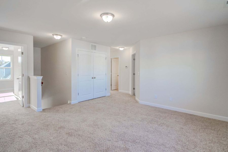Representative unfurnished interior of a home built from the Drayton by Caviness & Cates Communities in Bartlett Manor, Youngsville (Image 199).