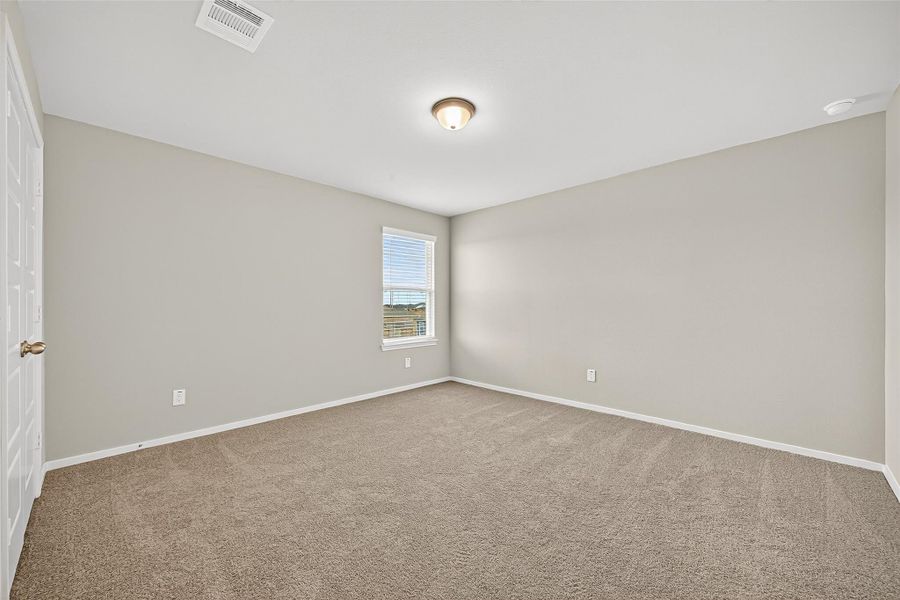 Spacious, unfurnished interior of a new home in Sunterra, Katy (Image 32).