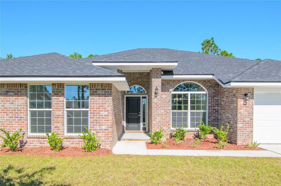 Exterior details and patio area of a home in Palm Coast, Palm Coast (Image 3).