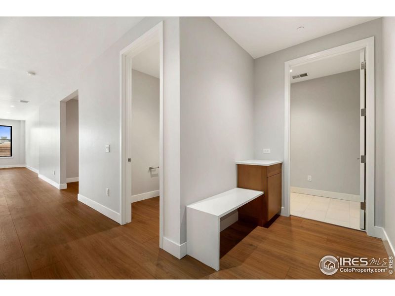 Entry includes drop zone, laundry room and half-bath.