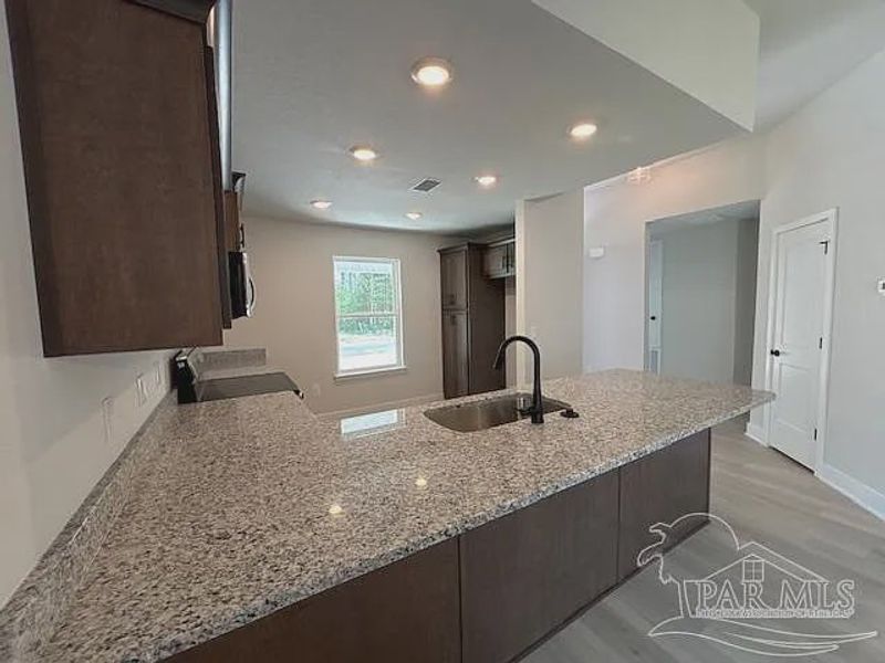 Furnished interior view inside a new home in Turtle Creek, Cantonment (Image 4).