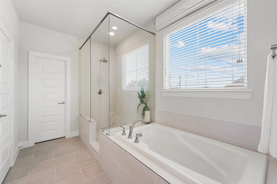 Furnished interior view inside a new home in The Corner At Buffalo Pointe, Houston (Image 11).
