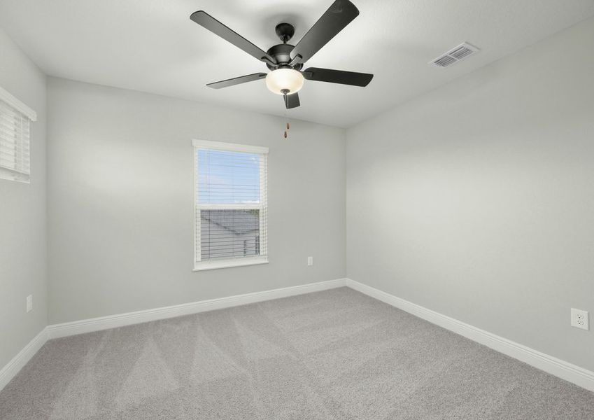 Each secondary bedroom comes with lush carpeting and  ceiling fan