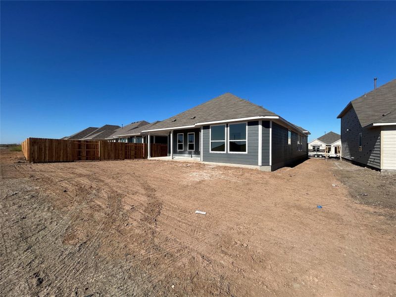Exterior details and patio area of a home in Willow Springs, Buda (Image 3). Exterior details and patio area of a home in Willow Springs, Buda (Image 3).