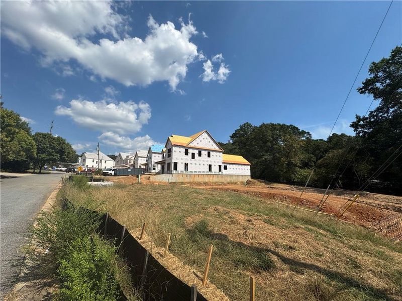 Front exterior of a new home in , Suwanee, GA, highlighting curb appeal (Image 11). Front exterior of a new home in , Suwanee, GA, highlighting curb appeal (Image 11).