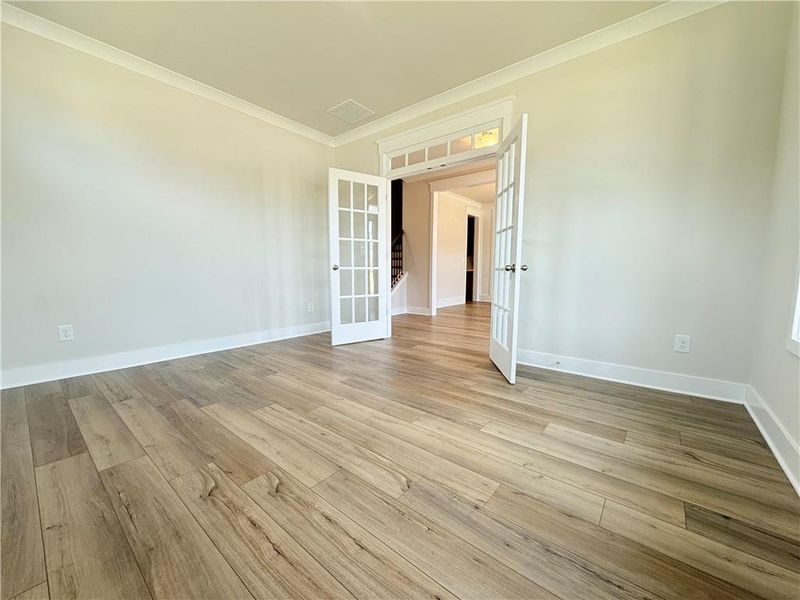 Spacious, unfurnished interior of a new home in Ponderosa Farms Reserve, Gainesville (Image 35).