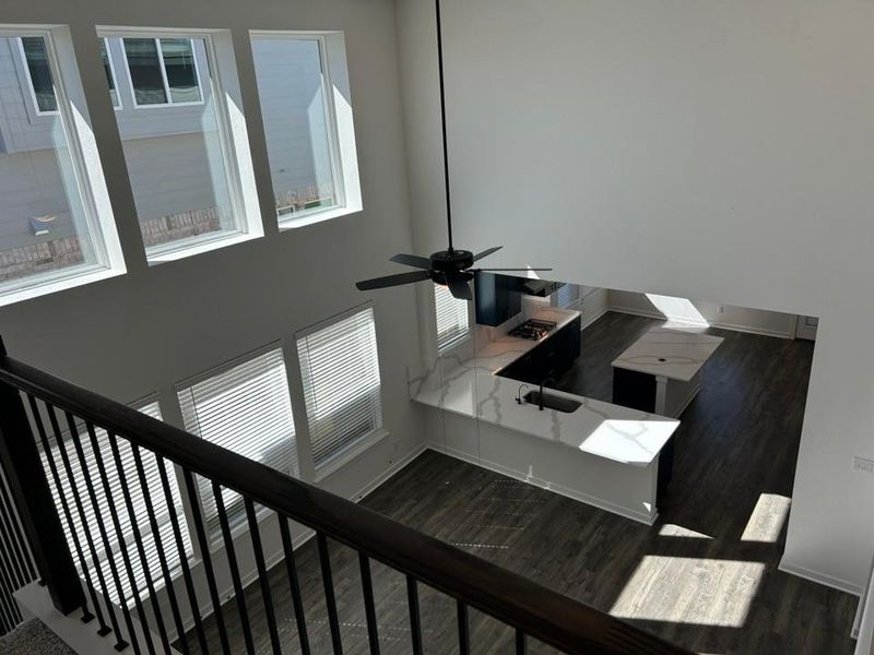 Detailed view of wood finished floors and ceiling fan Detailed view of wood finished floors and ceiling fan