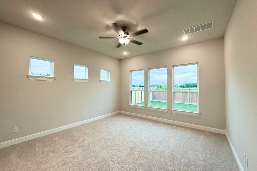 A spacious room offers ample natural light and a soothing neutral palette, perfect for personalized design. A spacious room offers ample natural light and a soothing neutral palette, perfect for personalized design.