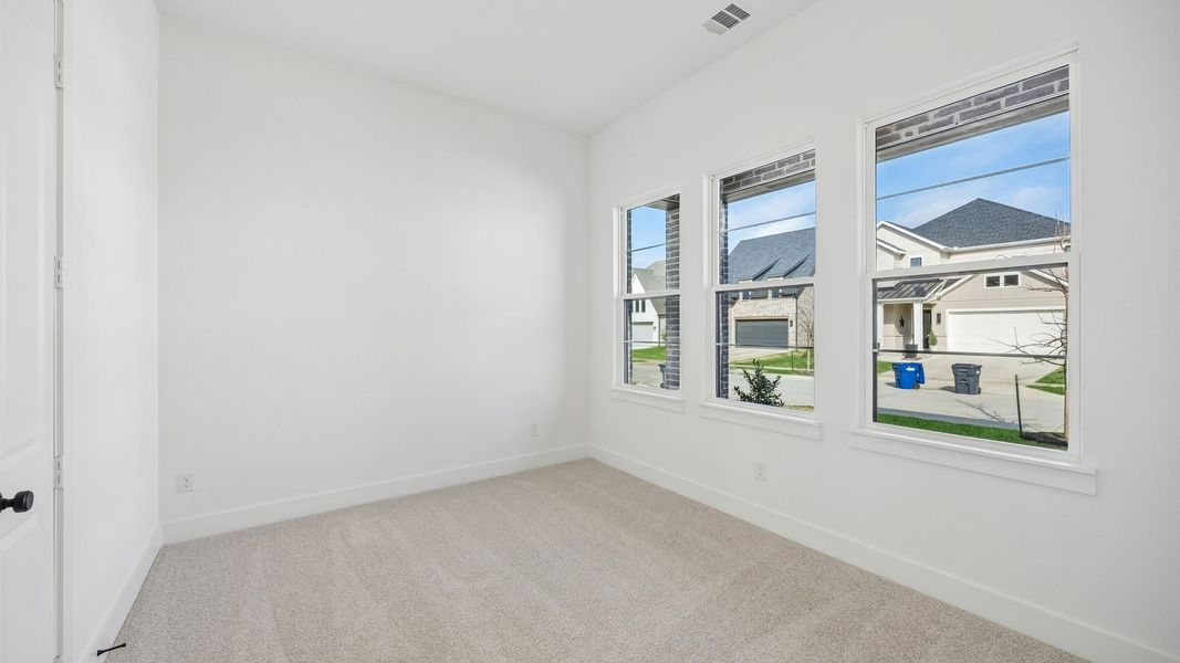 Spacious, unfurnished interior of a new home in Painted Tree 50' Series, McKinney (Image 12).