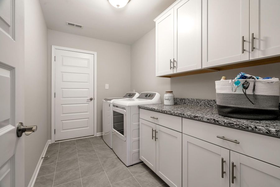 Representative furnished interior of a home built from the Chatham A by JC Jackson Homes,LLC in Heritage Pointe, Newport (Image 7).