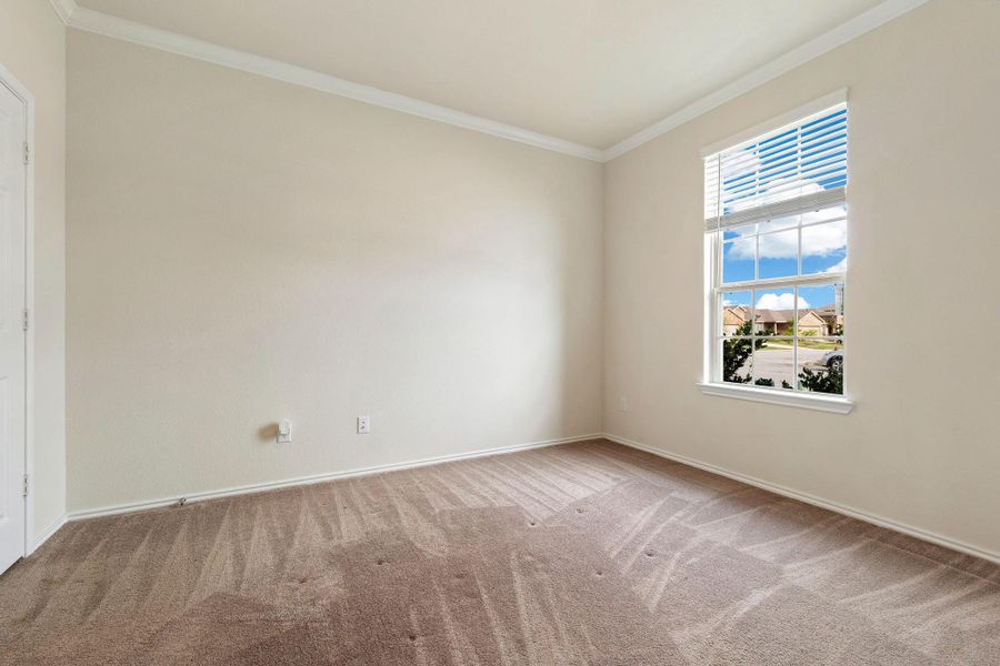 A dedicated home office space with ample natural light offers a tranquil work environment. A dedicated home office space with ample natural light offers a tranquil work environment.