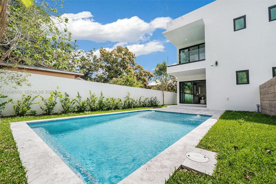 Exterior details and patio area of a home in , Miami (Image 4).