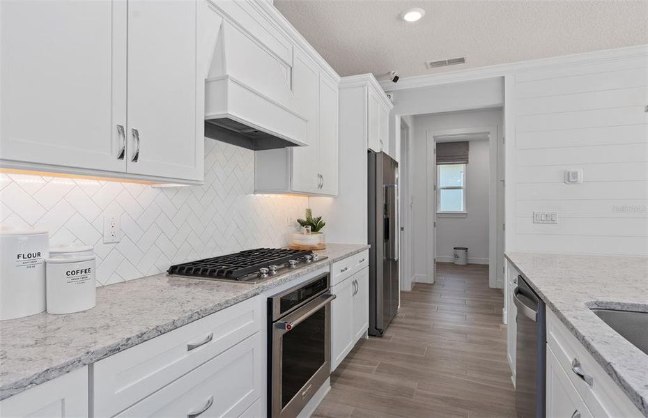 Furnished interior view inside a new home in Del Webb Sunbridge, St. Cloud (Image 27).
