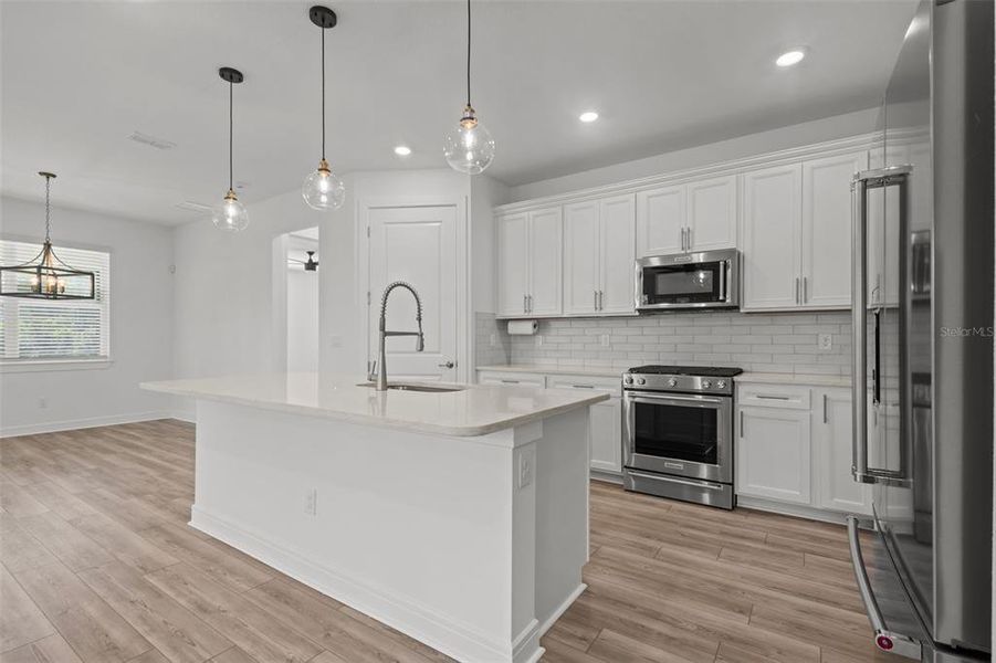 Kitchen - open to dining and living areas