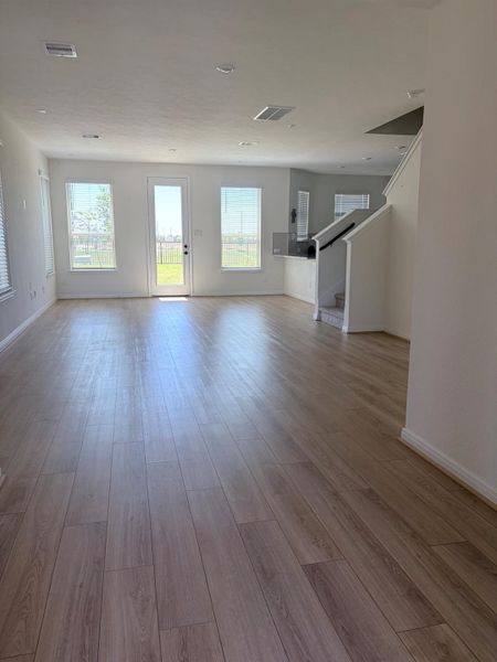 Spacious, unfurnished interior of a new home in Sunterra, Katy (Image 28).