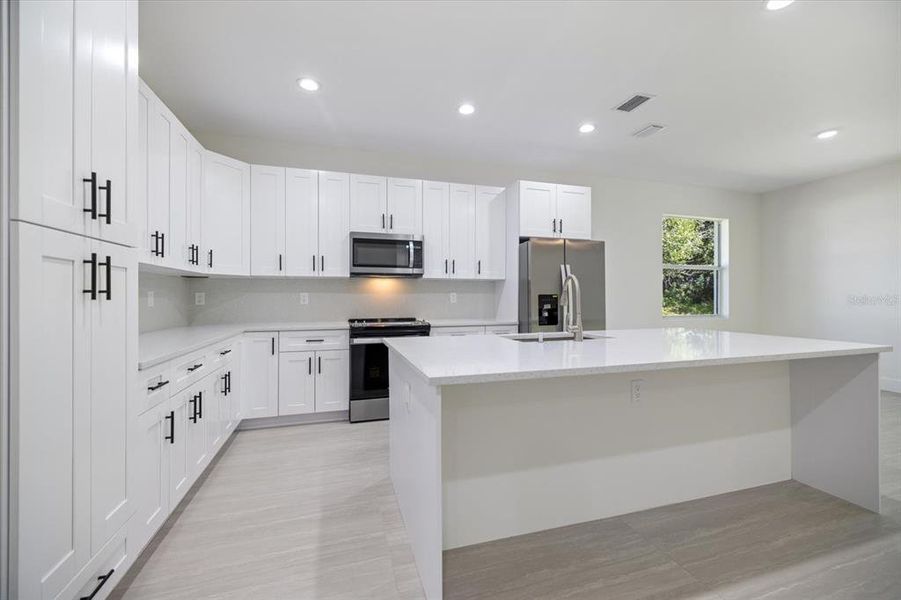 Furnished interior view inside a new home in , North Port (Image 9).