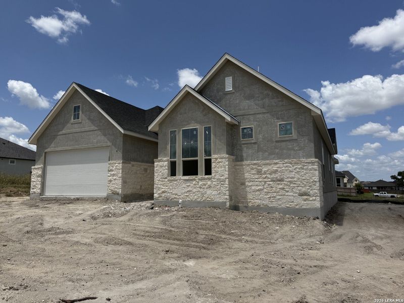 In-progress construction of a new home in The Reserve at Potranco Oaks, Castroville, TX (Image 27).