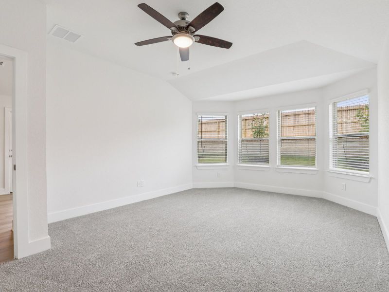 Primary bedroom in the Callaghan floorplan at a Meritage Homes community.