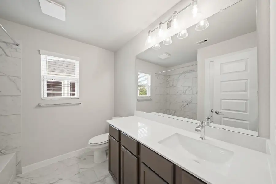 Furnished interior view inside a new home in Barton Creek Ranch, Conroe (Image 4).