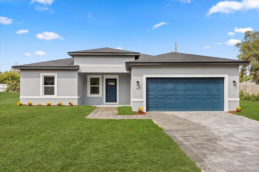 Front exterior of a new home in , Ocala, FL, highlighting curb appeal (Image 2). Front exterior of a new home in , Ocala, FL, highlighting curb appeal (Image 2).