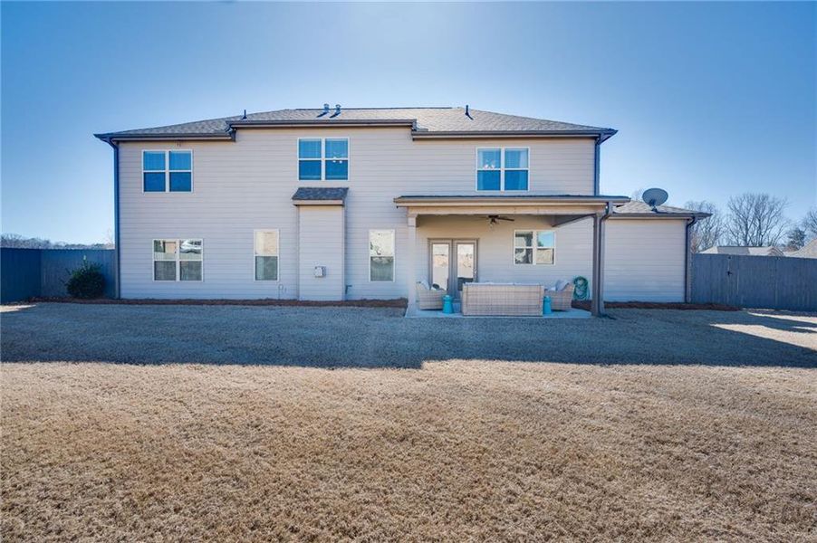 Front exterior of a new home in Sierra Lake, Cumming, GA, highlighting curb appeal (Image 1). Front exterior of a new home in Sierra Lake, Cumming, GA, highlighting curb appeal (Image 1).