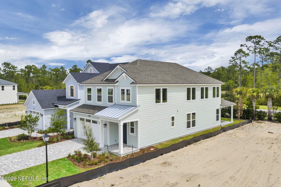 Front exterior of a new home in Seabrook Village at Seabrook, Nocatee, FL, highlighting curb appeal (Image 27).