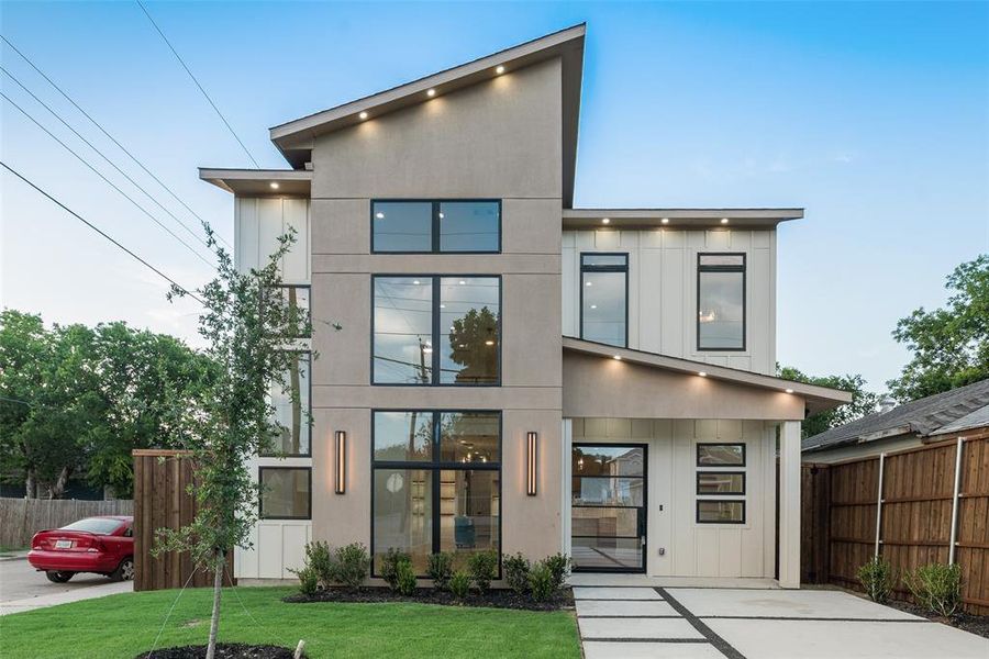 Front exterior of a new home in , Dallas, TX, highlighting curb appeal (Image 4).