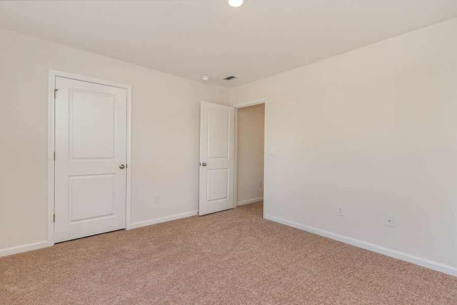 Representative unfurnished interior of a home built from the HAYDEN by D.R. Horton in Island Green, Myrtle Beach (Image 26).
