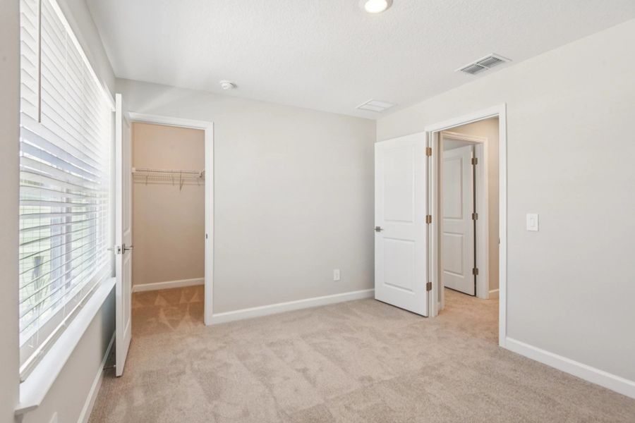 Bedroom 3 has a spacious walk-in closet
