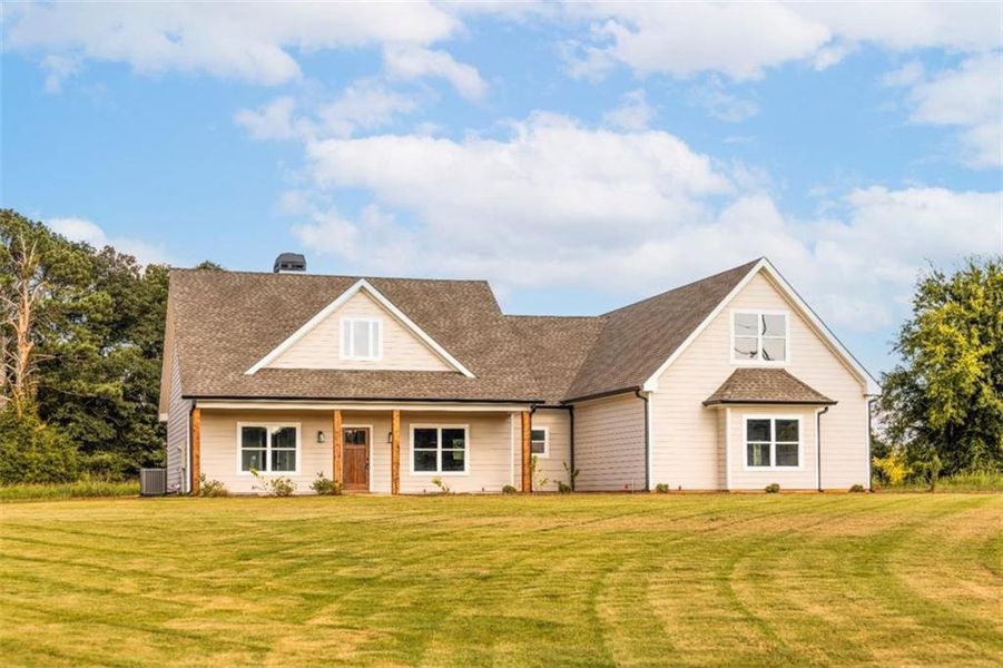 Front exterior of a new home in , Social Circle, GA, highlighting curb appeal (Image 24).