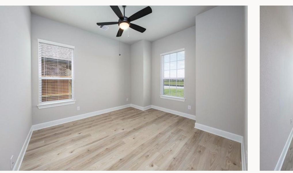 Spacious, unfurnished interior of a new home in Sierra Vista, Iowa Colony (Image 3).