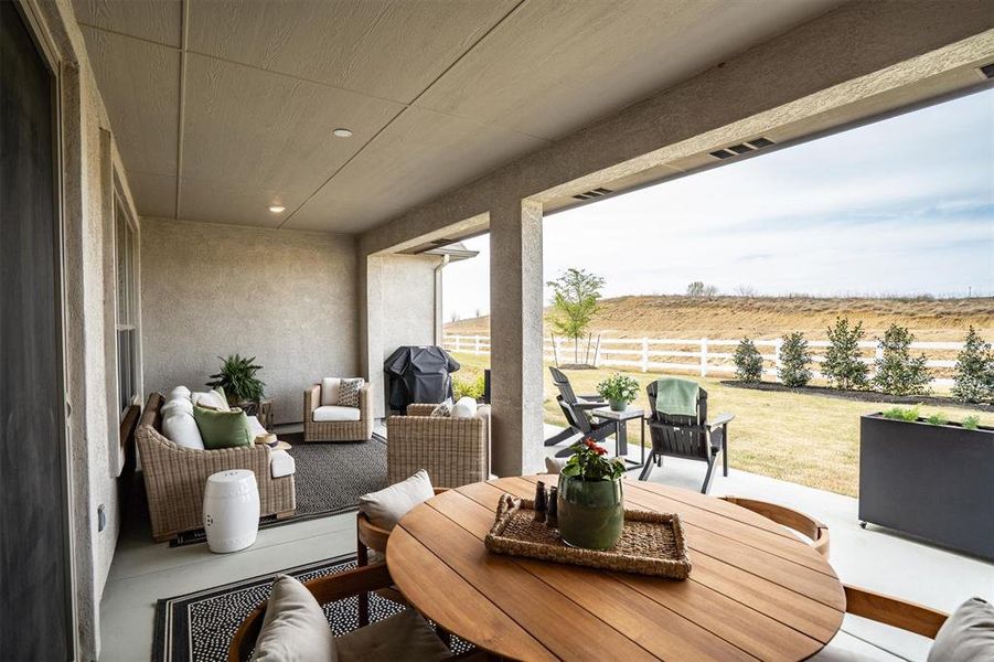 Exterior details and patio area of a home in Robson Ranch Texas, Denton (Image 26).