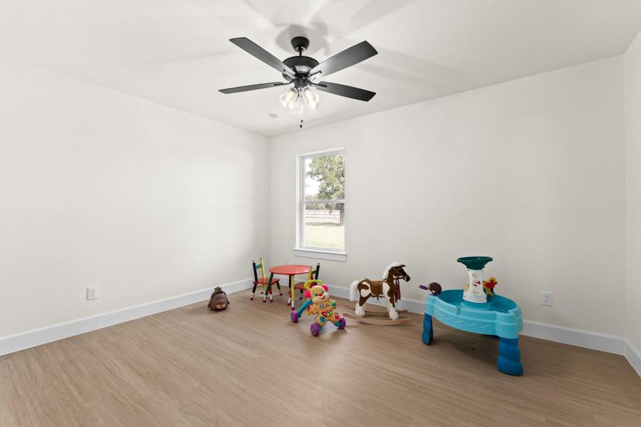 Recreation room featuring light wood-type flooring