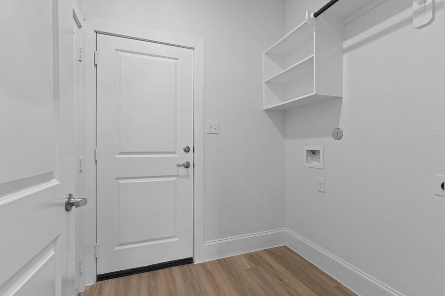 Laundry room has a wonderful storage area when you open the door and see it.  So come on make that call and let me show you this stunning new home and the lake living lifestyle.