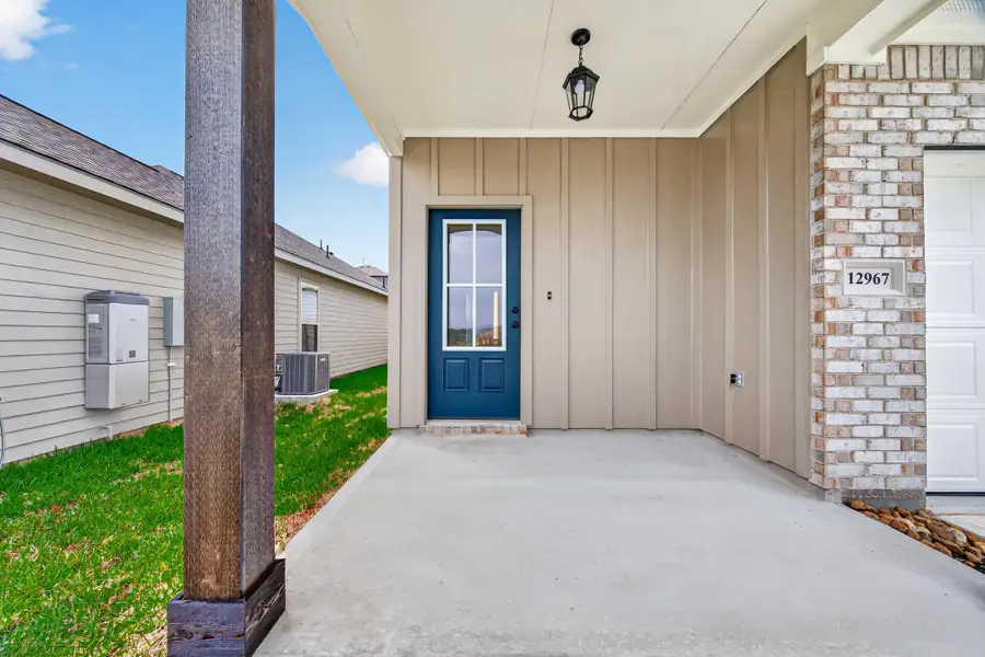 Exterior details and patio area of a home in Mostyn Springs, Magnolia (Image 3).