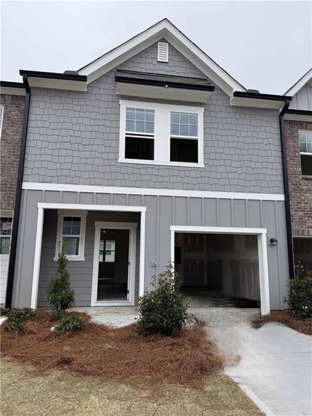 Front exterior of a new home in Kingston Cove, Auburn, GA, highlighting curb appeal (Image 5).
