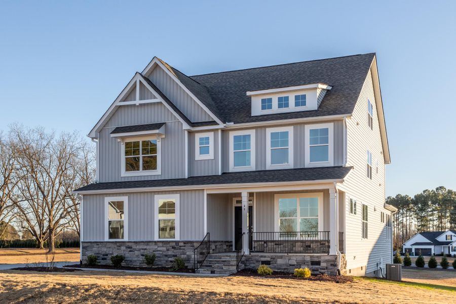 Front exterior of a new home in Berea Farms, Four Oaks, NC, highlighting curb appeal (Image 2).