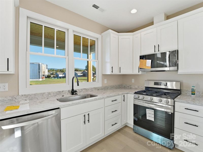 Furnished interior view inside a new home in , Hendersonville (Image 10).