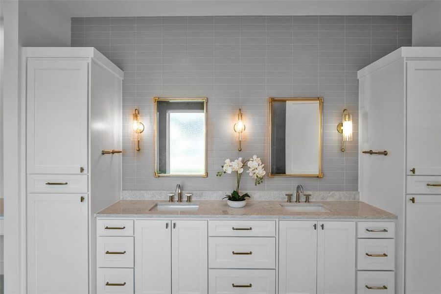 Primary bath with designer lighting.