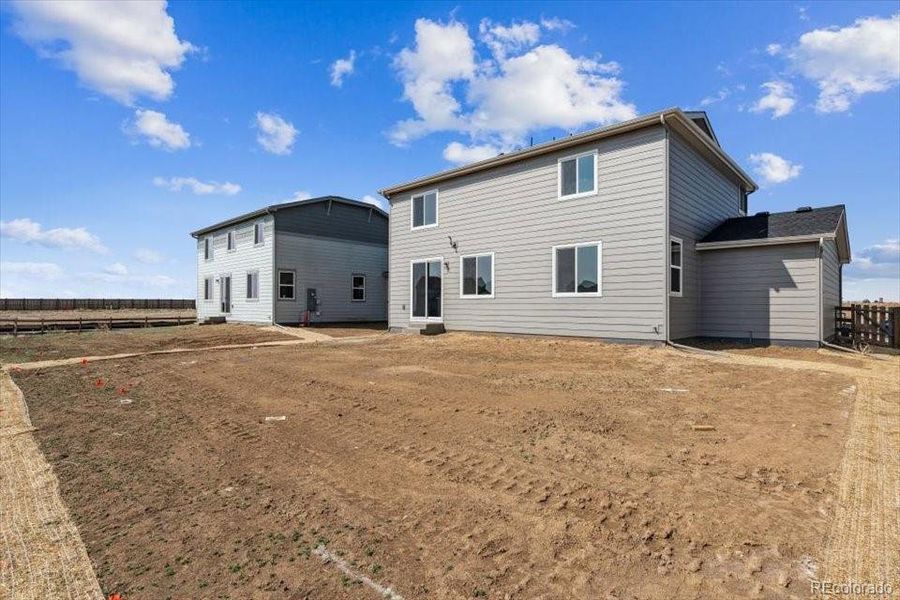 Front exterior of a new home in Red Barn Meadows, Mead, CO, highlighting curb appeal (Image 19).