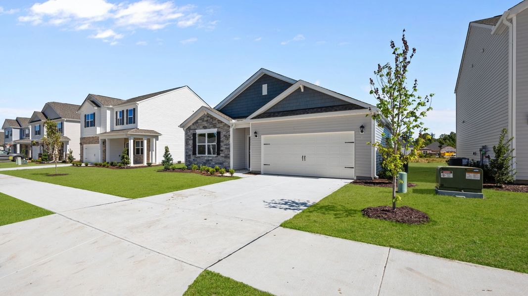 Front exterior of a new home in West New Bern, New Bern, NC, highlighting curb appeal (Image 20).