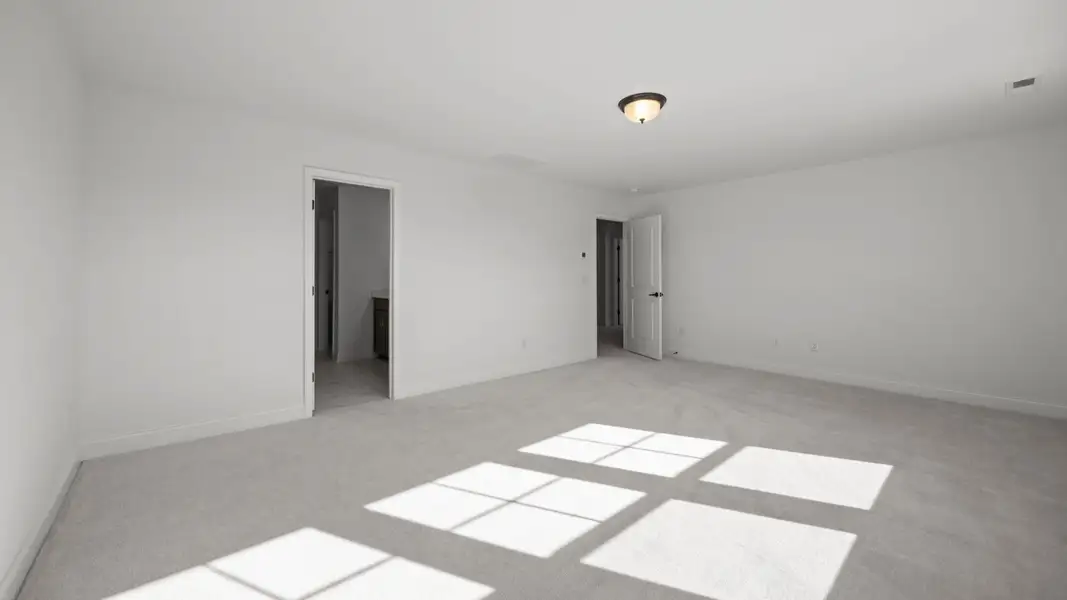 The Burton Plan in Lakeside Glen by DBR Homes in York, SC -Primary Bedroom