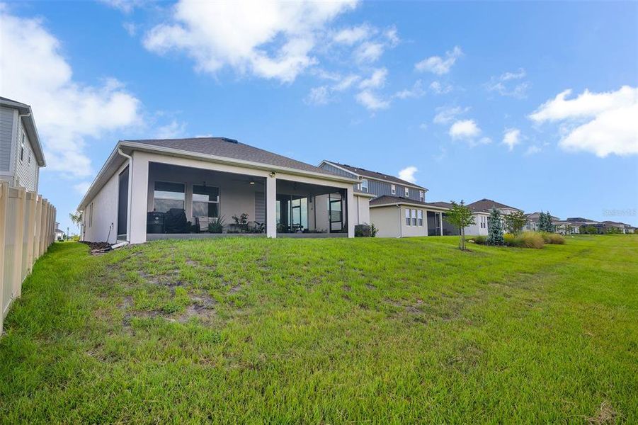 Exterior details and patio area of a home in Wellness Ridge: Chateau Collection, Clermont (Image 32).