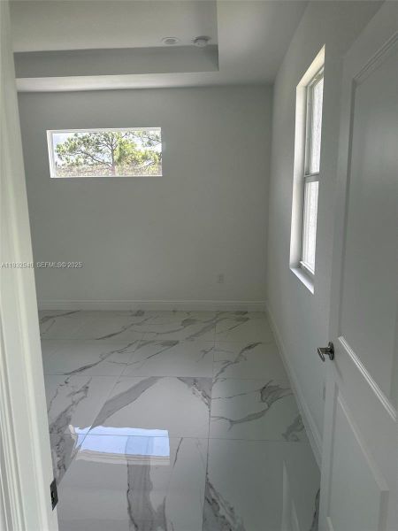 Spacious, unfurnished interior of a new home in , Lehigh Acres (Image 14).