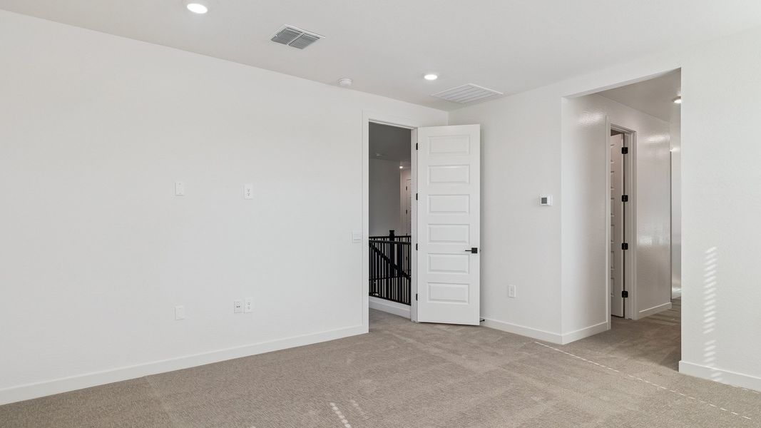 Representative unfurnished interior of a home built from the Crow by D.R. Horton in The Ridge at Stone Butte, Phoenix (Image 36).
