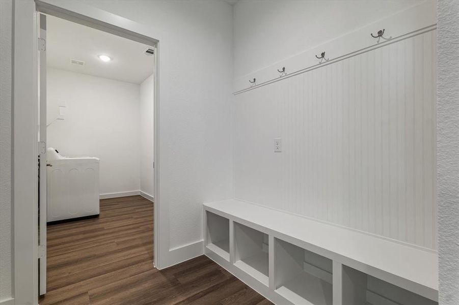 Mudroom featuring dark hardwood / wood-style floors